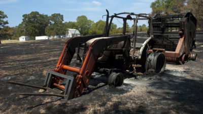 Picture of a burned out hay bailer