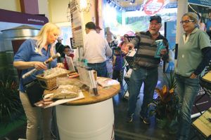Visitors of the State Fair of Texas at the Texas A&M AgriLife Extension Service's booth display 