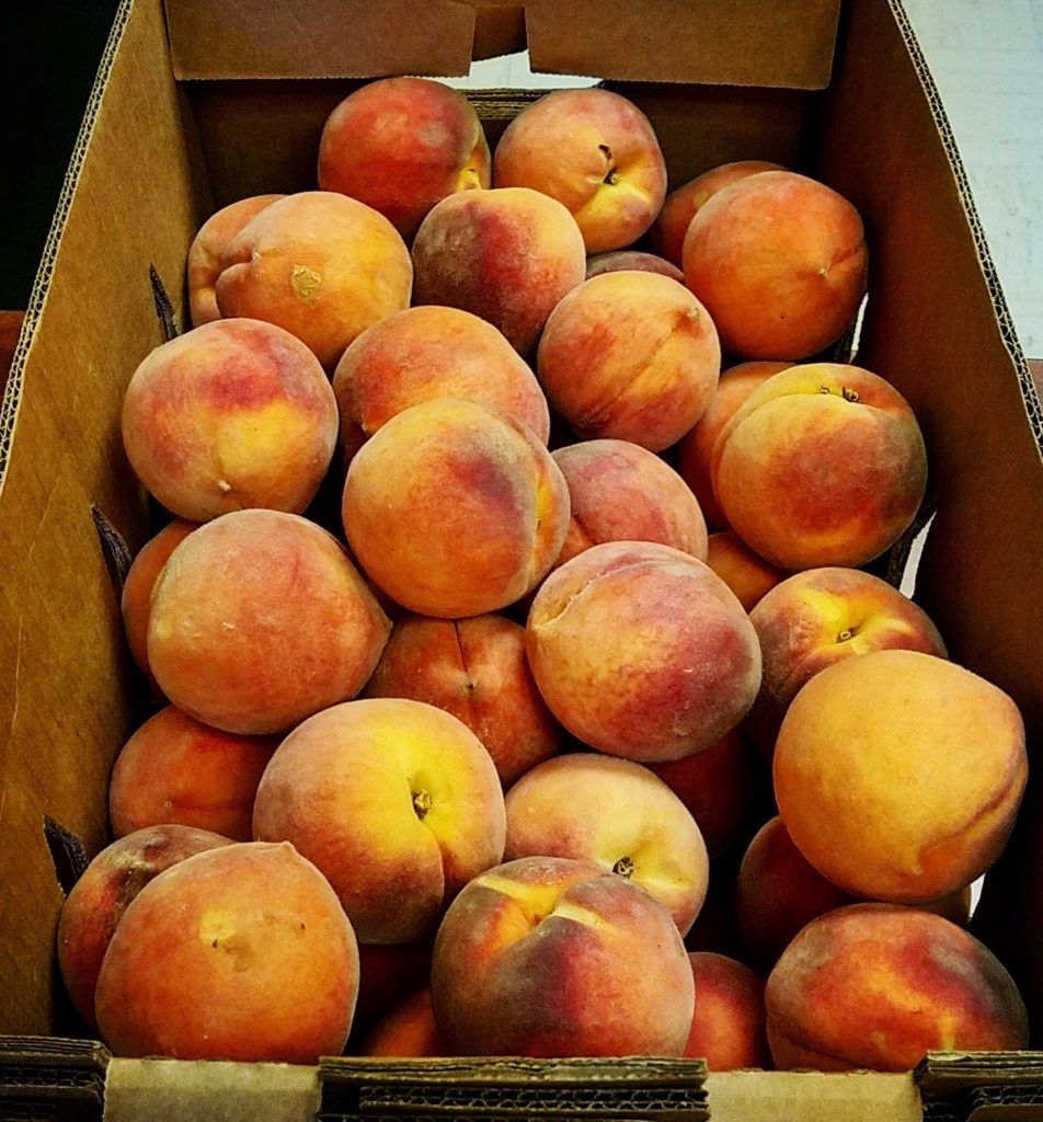 box of fresh peaches - concern raised with salmonella 