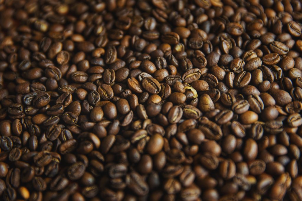 Cluster of roasted coffee beans, a second cup could be beneficial