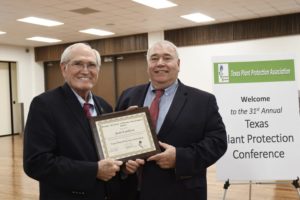 Juan Landivar receives Norman Borlaug Lifetime Achievement Award at the Texas Plant Protection Association conference.