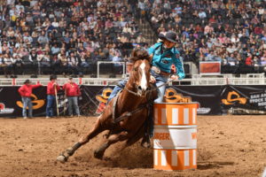 Barrel racer Shali Lord competes at the San Antonio Stock Show