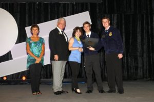 Jason Edmondson ’19 ’21 (second from right) was presented with the San Antonio Stock Show & Rodeo Scholarship during the 87th annual Texas FFA State Convention, which allowed him to pursue his undergraduate degree at Texas A&M.