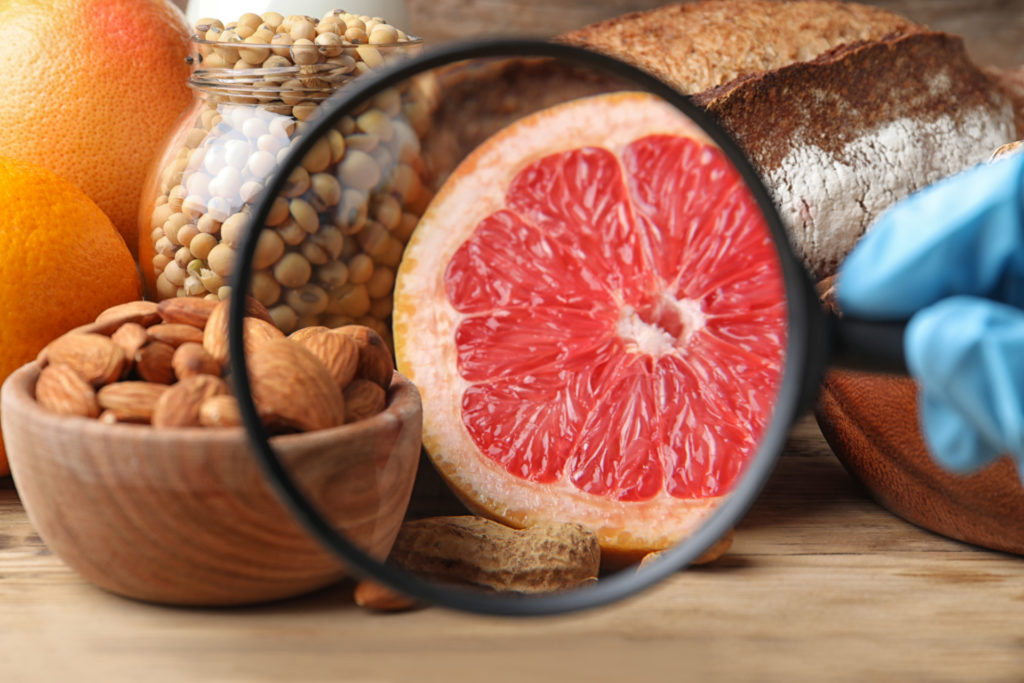 Magnified image of a grapefruit and other foods, nutrition research
