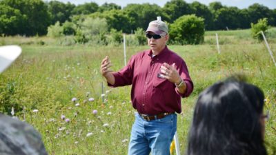 AgriLife Research's Bill Fox speaking outdoors on range management