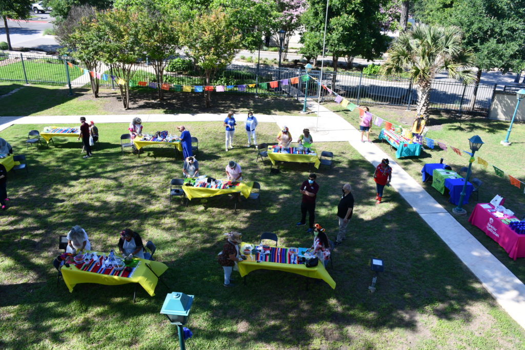 A park setting hosting the Taste of Cinco de Mayo event in San Antonio. 