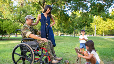 Military family with wounded warrior in wheelchair