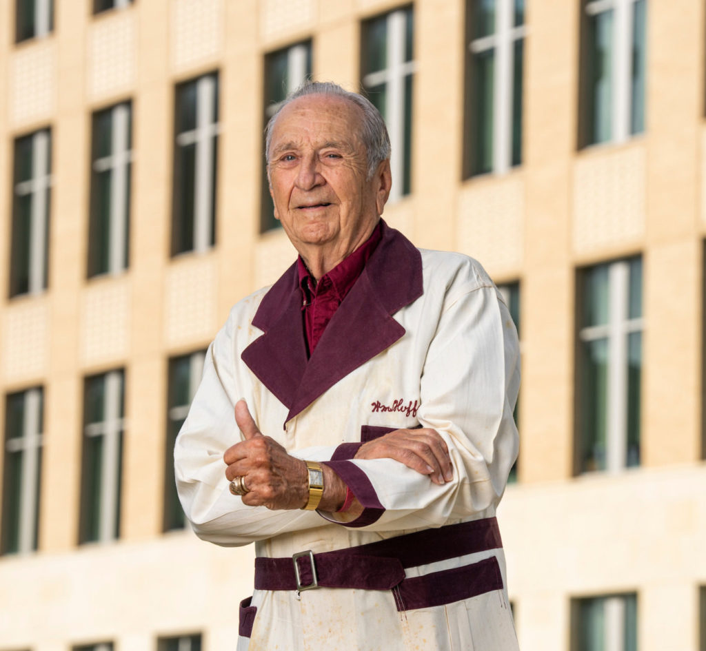 Bill Huffman '53 wearing the team jacket and watch he won as a member of the Texas A&M Junior Poultry Judging Team.
