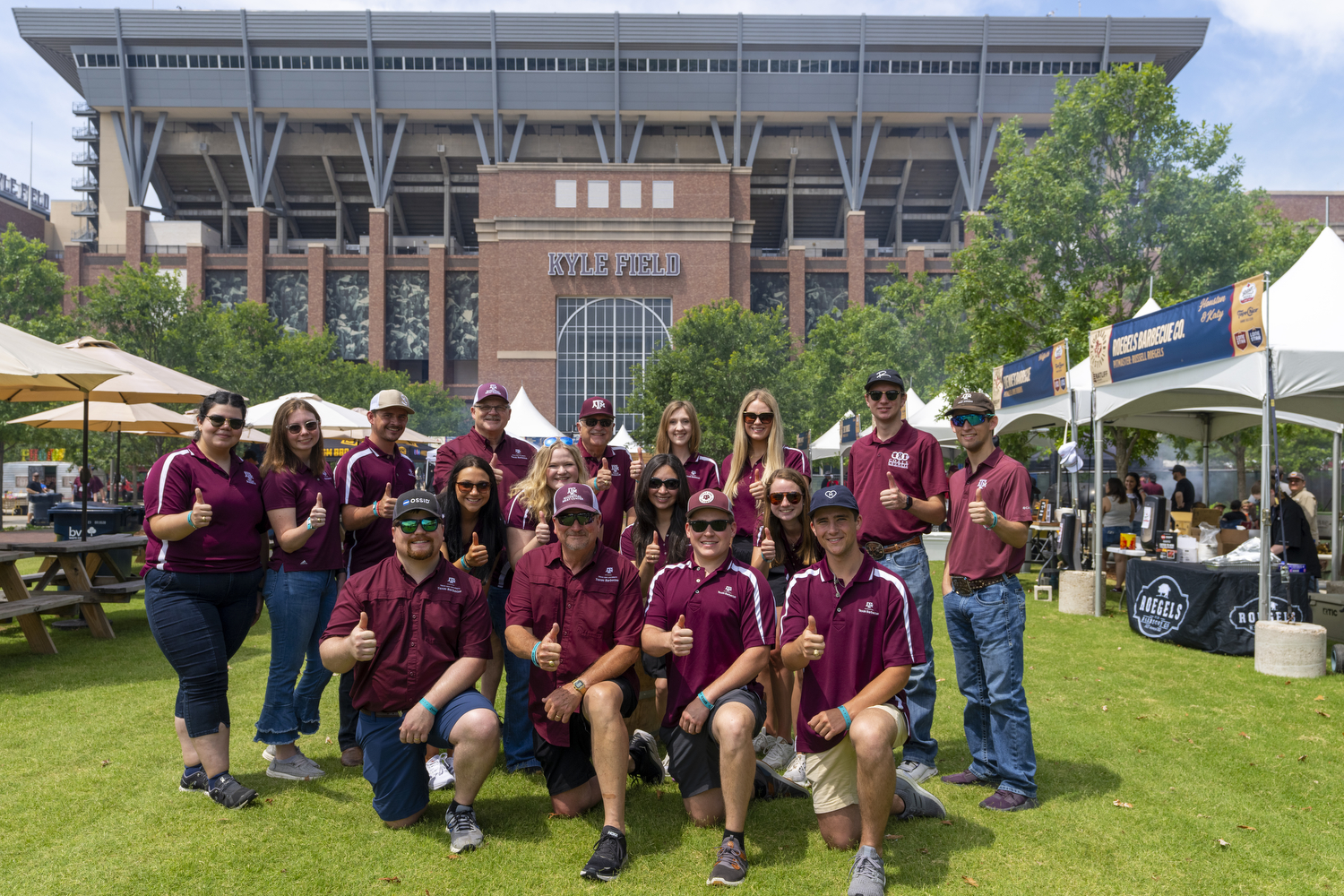 Texas A&M team members pose for a picture during the Troubadour Festival, which brought together barbecue and music while educating the public about meat science and food safety.