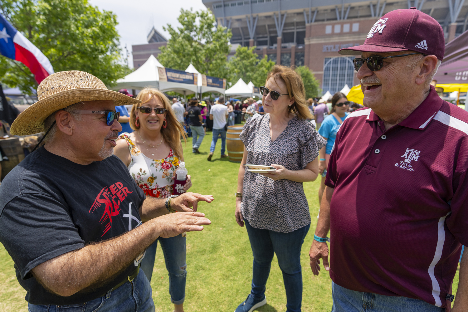 Vice Chancellor and Dean Jeff Savell speaks with Bryan Mayor Bobby Gutierrez during the Troubadour Festival