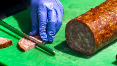 Cutting smoked meat product