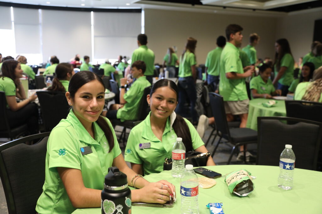 Group of Texas 4-H members in green 4-H shirts  