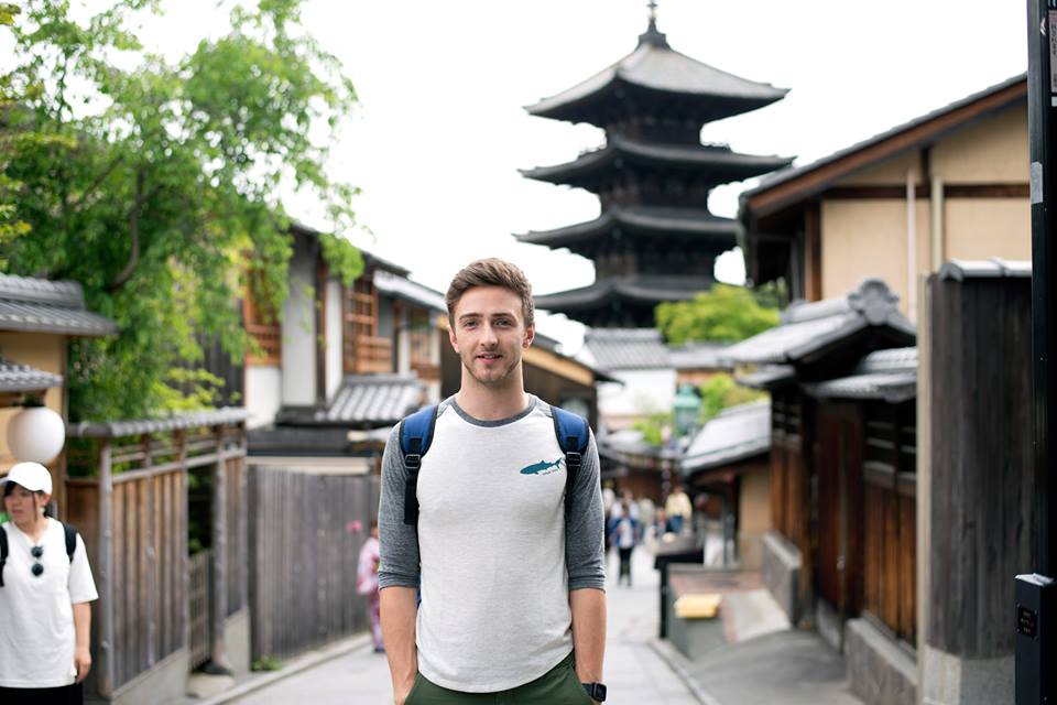 Head and shoulders photo of former student Chase Dorsett standing in a neighborhood in Japan. 