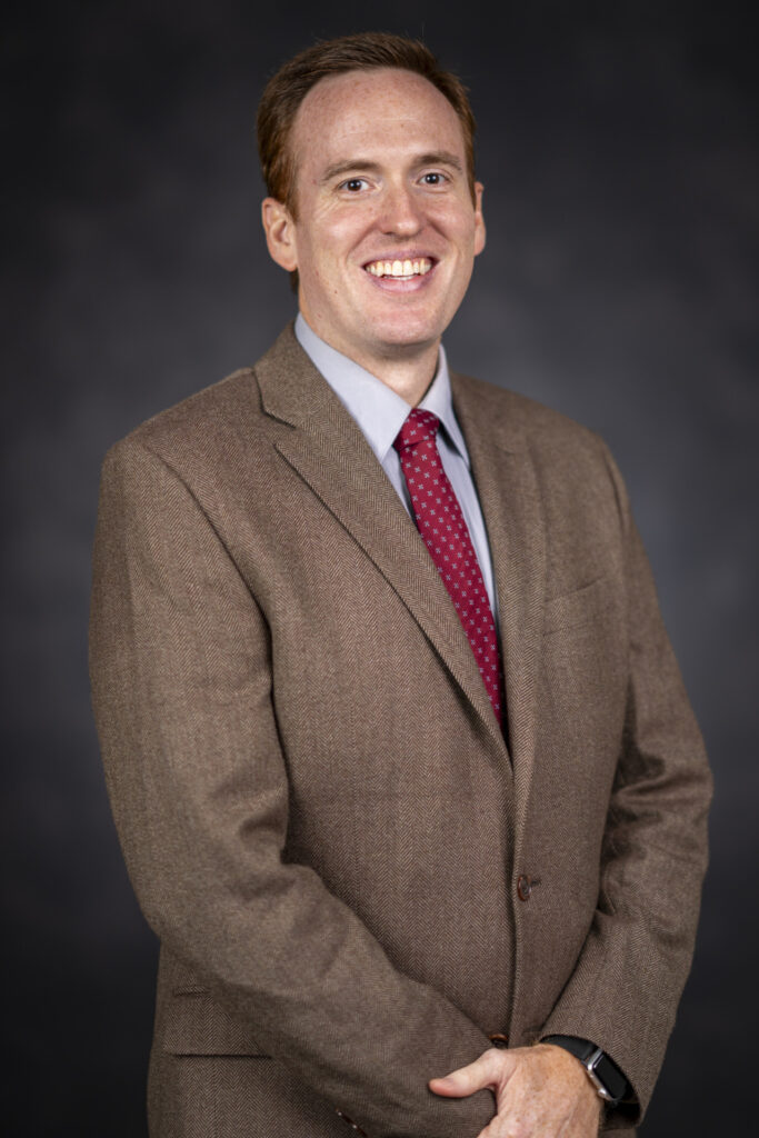 Head and torso photo of Connor Clark, Ph.D., an expert in sustainable tourism who has joined the Department of Hospitality, Hotel Management and Tourism at Texas A&M. 