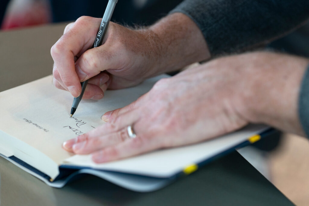 A man is writing notes in a notebook. People will be able to learn how to write a will and understand the legal requirements of planning an estate during the Jan. 12 Estate Planning Seminar that will be held at the Navarro County Expo Center. 