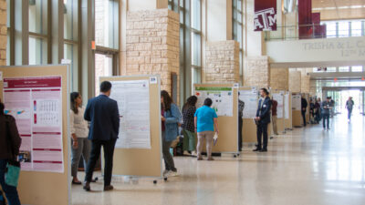 Participants in the poster competition are in the Memorial Student Center displaying their posters during a previous Texas A&M Water Day.