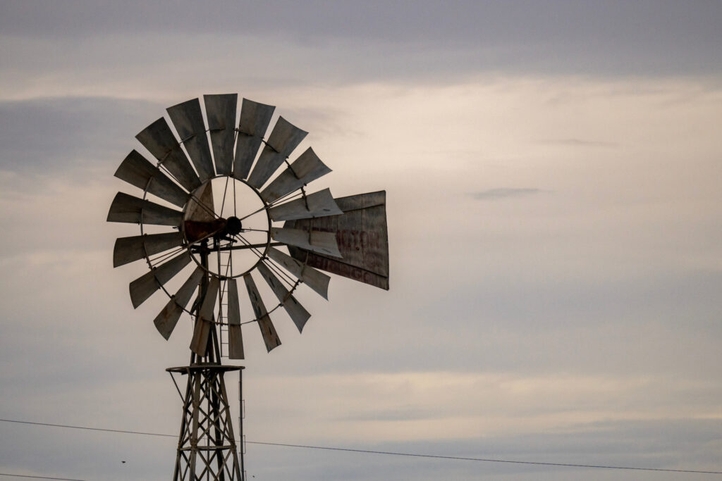 A windmill with an overcast sky. Residents in Cottle, Foard, Hardeman, Childress, King and Motley counties will be able to have their well water tested and learn the results at a Texas Well Owner Network event on March 18-19,