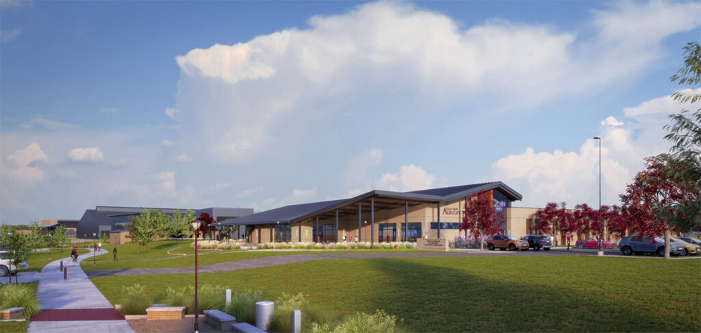 A rendering of the new Texas A&M AgriLife Research and Extension Center at Canyon. The brown building has grass and walking paths in front of it and one the side. 