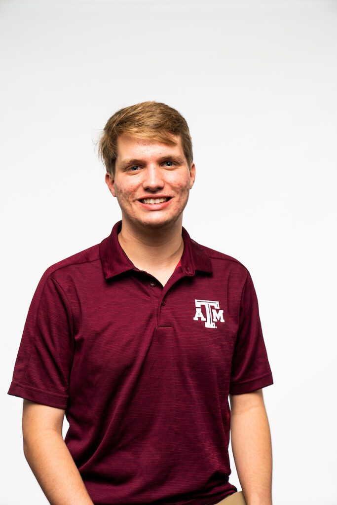 Brown-Rudder Award recipient Clayton Elbel - smiling male student in maroon Texas A&M logoed shirt