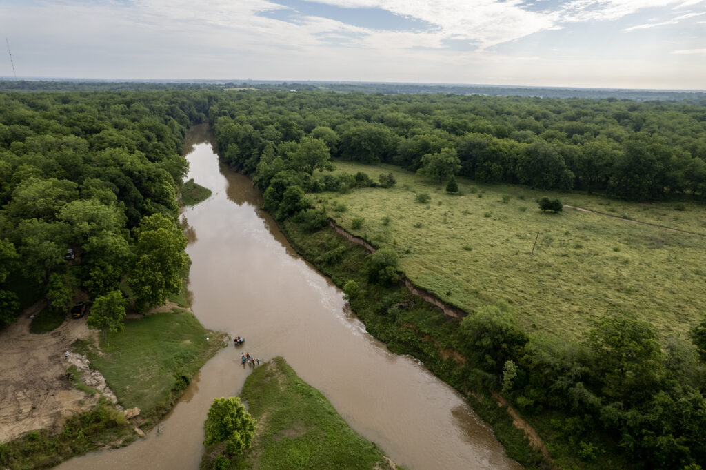 An aerial photo of a river. Residents living near the East Fork of the San Jacinto River will learn about the watershed and the steps to take for improvement during a Texas Watershed Steward workshop on June 11 in Cleveland. 