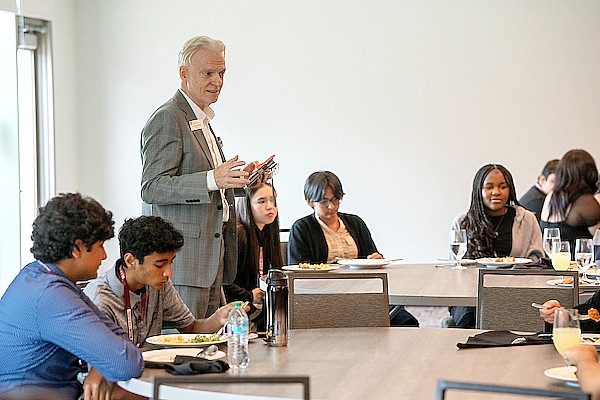 Brian King, Ph.D., head of the Department of Hospitality, Hotel Managment and Tourism, speaking to students about hospitality