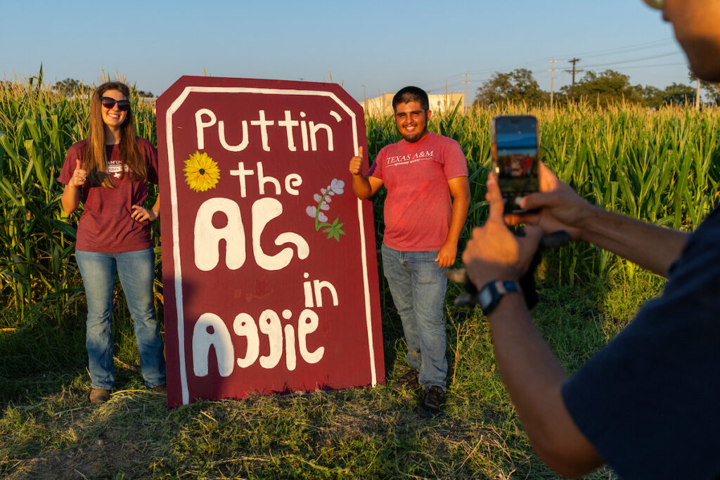 A large sign that reads Puttin the Ag in Aggie